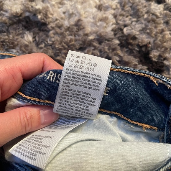 Hi-Rise Distressed Jean Shorts - Picture 6 of 9